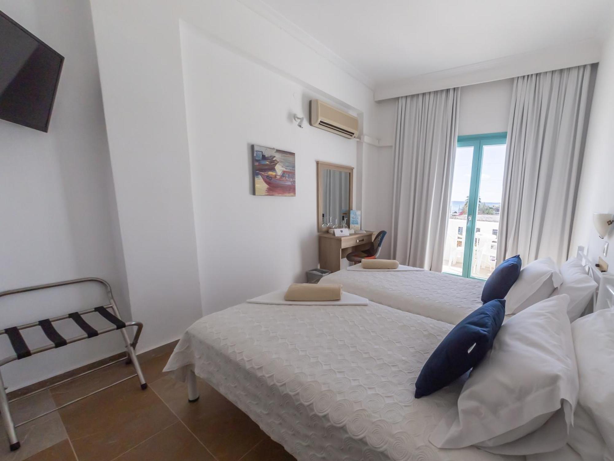 Amaryllis Beach Hotel Chrisi Akti  Quarto foto